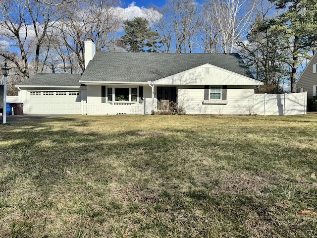 ranch-style house with a front yard, a shingled roof, a garage, and a chimney