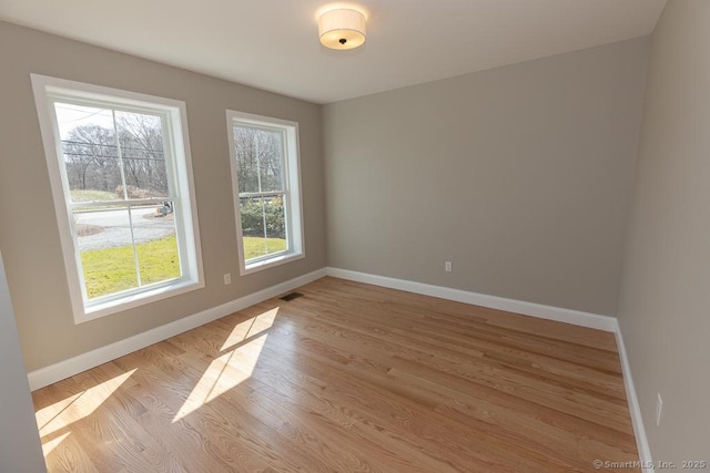 58 Killingworth Tpke, Clinton, CT 06413 - spare room with baseboards, visible vents, and light wood-style flooring