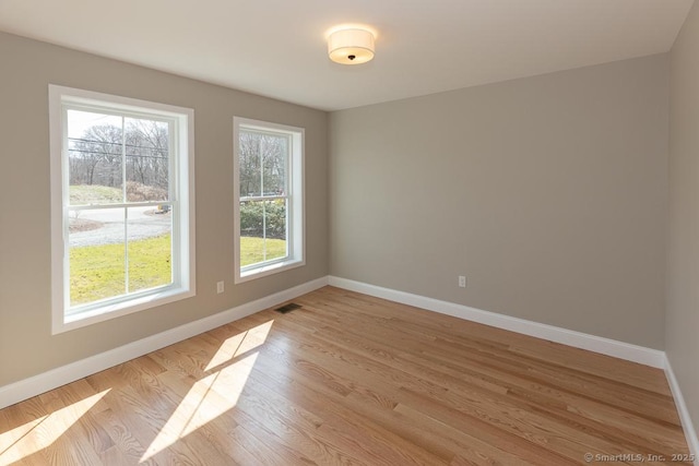 58 Killingworth Tpke, Clinton, CT 06413 - empty room featuring baseboards and light wood-style floors