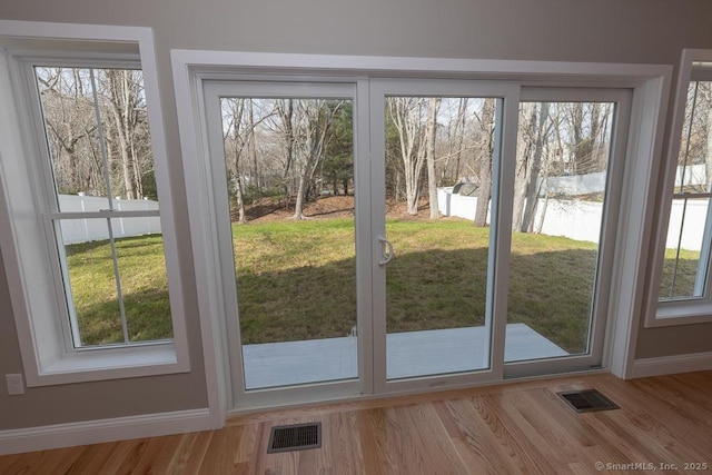 58 Killingworth Tpke, Clinton, CT 06413 - entryway featuring baseboards, visible vents, and light wood-style flooring