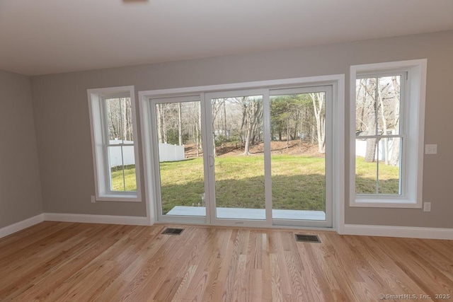 58 Killingworth Tpke, Clinton, CT 06413 - entryway with baseboards, visible vents, and light wood-style floors