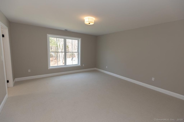 58 Killingworth Tpke, Clinton, CT 06413 - unfurnished room with baseboards and light carpet