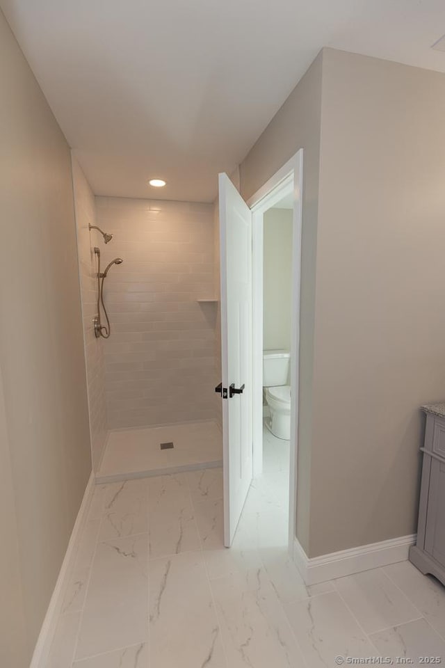 58 Killingworth Tpke, Clinton, CT 06413 - interior space with marble finish floor, toilet, baseboards, and tiled shower