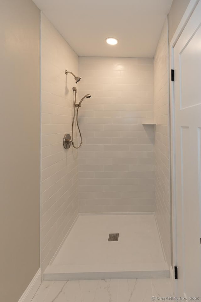 58 Killingworth Tpke, Clinton, CT 06413 - full bathroom featuring baseboards, marble finish floor, and a stall shower