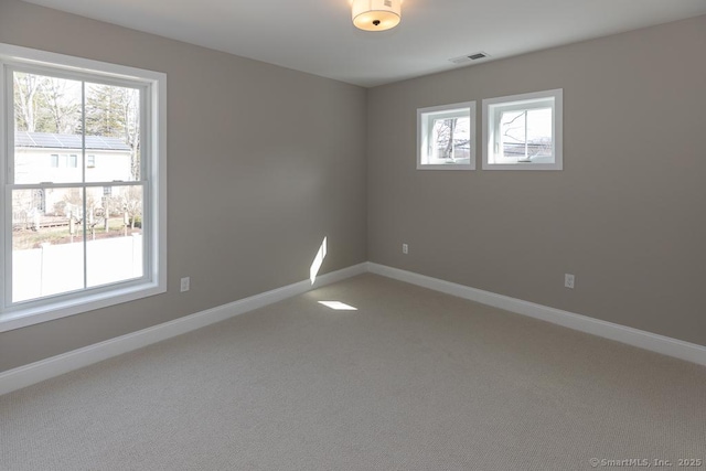 58 Killingworth Tpke, Clinton, CT 06413 - empty room featuring baseboards, visible vents, and a healthy amount of sunlight