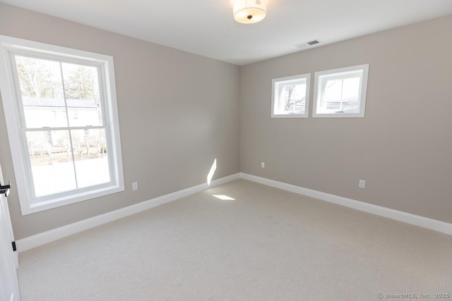 58 Killingworth Tpke, Clinton, CT 06413 - spare room with baseboards, visible vents, and light carpet