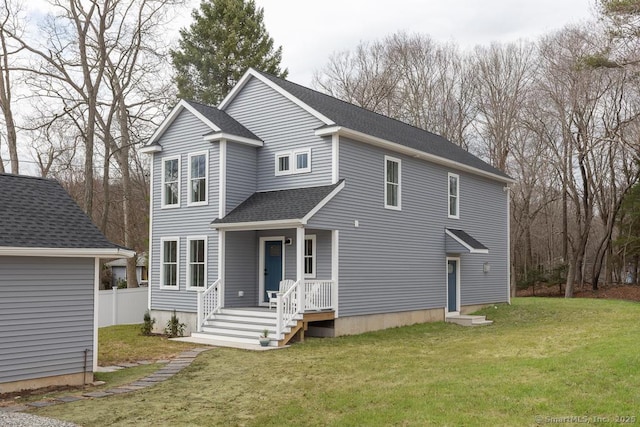 58 Killingworth Tpke, Clinton, CT 06413 - view of front of house with a shingled roof, a front yard, and fence