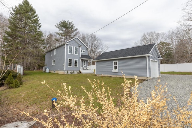 58 Killingworth Tpke, Clinton, CT 06413 - back of house with a yard, driveway, and fence
