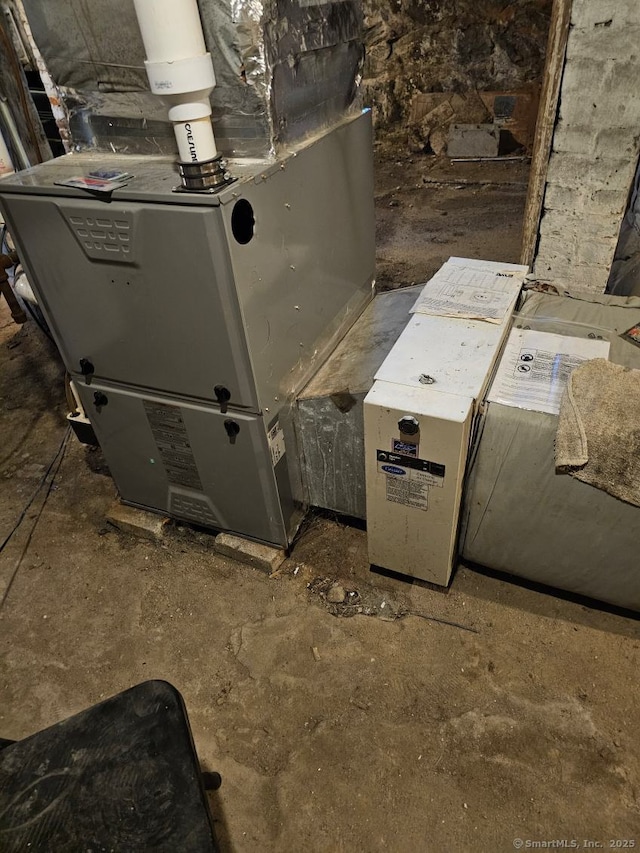 125 Mckinley Ave, Norwich, CT 06360 - utility room with heating unit