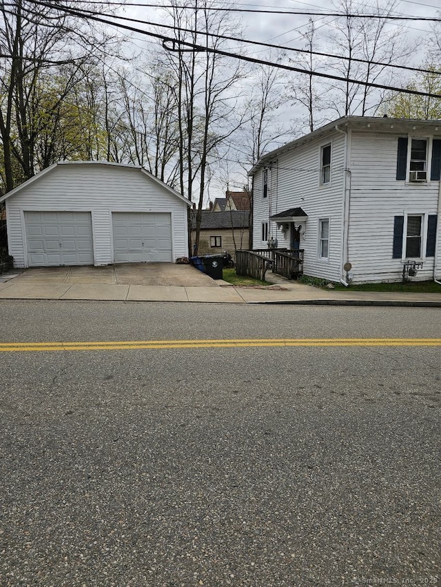 125 Mckinley Ave, Norwich, CT 06360 - view of side of property with an outdoor structure and a garage