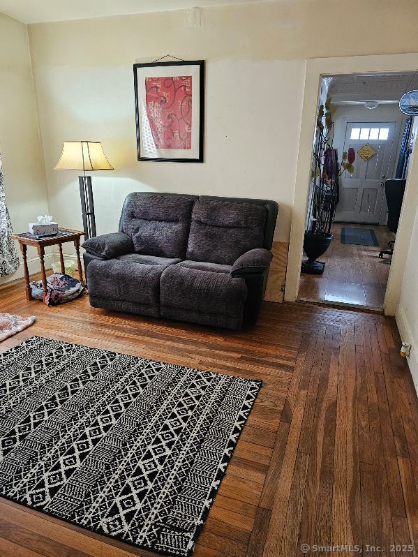 125 Mckinley Ave, Norwich, CT 06360 - living area with baseboards and hardwood / wood-style floors