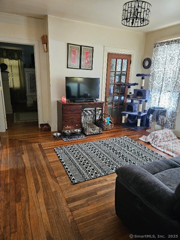 125 Mckinley Ave, Norwich, CT 06360 - living room with wood finished floors
