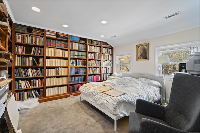 carpeted bedroom featuring recessed lighting, lofted ceiling, and visible vents