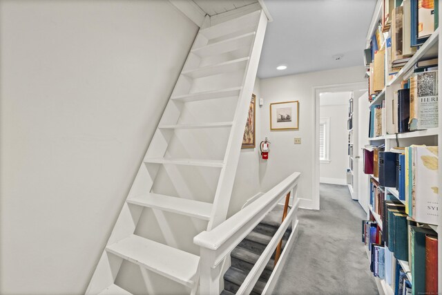 staircase with baseboards, carpet flooring, and recessed lighting