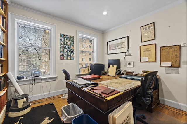 office area featuring hardwood / wood-style floors, a healthy amount of sunlight, crown molding, and baseboards