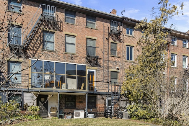 view of property featuring cooling unit and ac unit