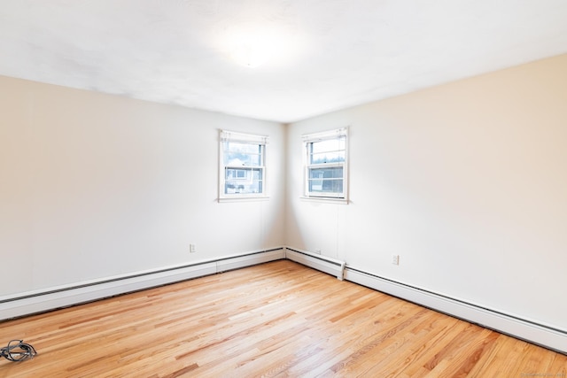 empty room featuring wood finished floors