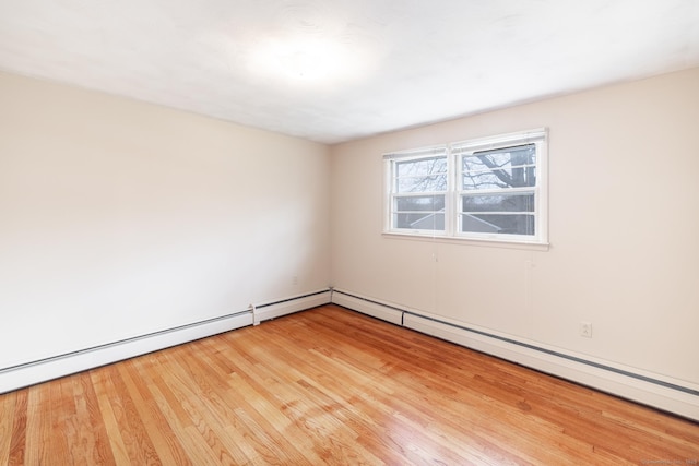 empty room featuring wood finished floors