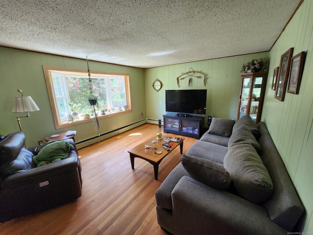 27 Payne Pl, Meriden, CT 06450 - living area featuring a baseboard radiator, a textured ceiling, and wood finished floors
