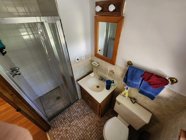 27 Payne Pl, Meriden, CT 06450 - full bathroom featuring tile walls, a stall shower, toilet, and vanity