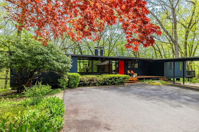 29 Lighthouse Rd, Woodbury, CT 06798 - mid-century inspired home featuring a chimney