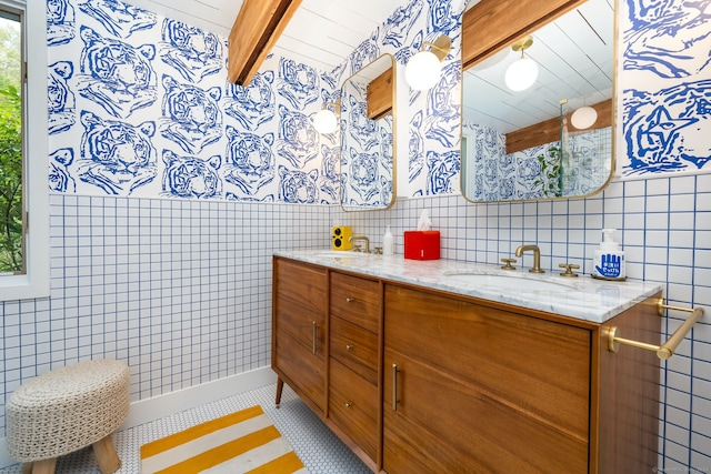 29 Lighthouse Rd, Woodbury, CT 06798 - bathroom featuring tile walls, double vanity, and beamed ceiling