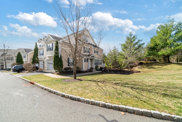 1 Winding Trl Unit 1, Middlebury, CT 06762 - view of home's exterior with a garage, driveway, a residential view, and a yard