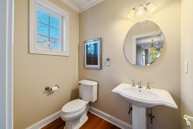 1 Winding Trl Unit 1, Middlebury, CT 06762 - bathroom with baseboards, wood finished floors, ornamental molding, and toilet