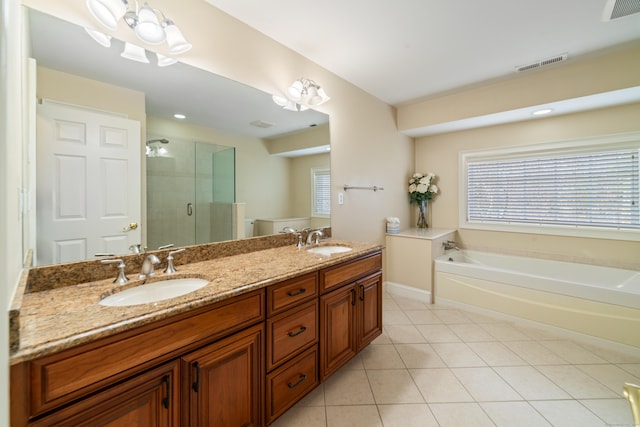 1 Winding Trl Unit 1, Middlebury, CT 06762 - bathroom featuring tile patterned flooring, a garden tub, a shower stall, and double vanity