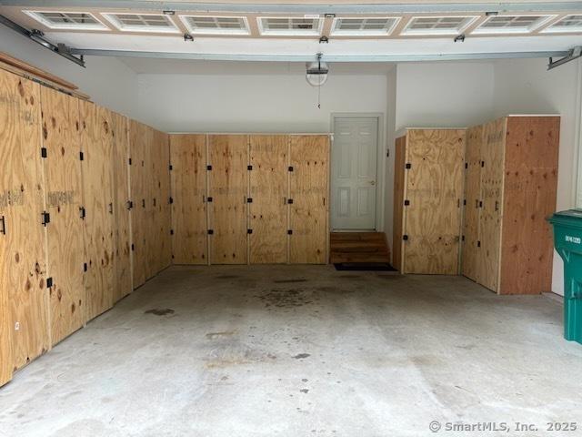 1 Winding Trl Unit 1, Middlebury, CT 06762 - garage with a garage door opener