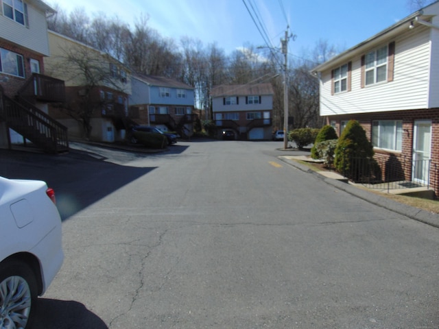 200 Yale St Unit 31B, Waterbury, CT 06704 - view of street featuring a residential view, curbs, and sidewalks