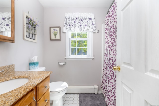 full bathroom featuring vanity, a baseboard heating unit, and toilet