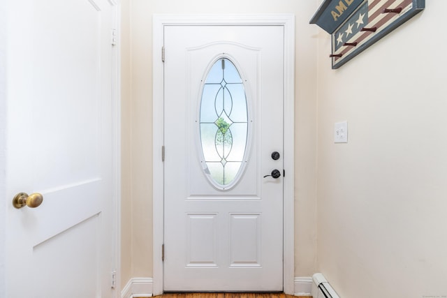 entryway featuring baseboards