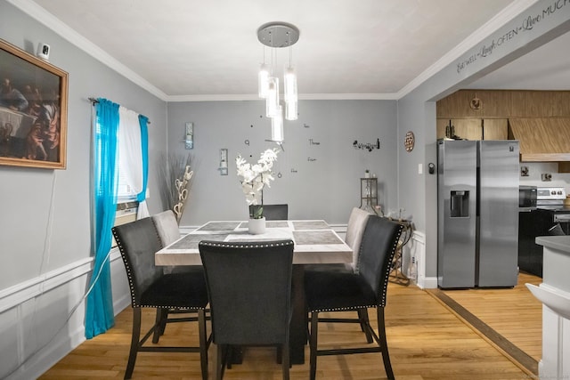 17 Winfield Dr, Stratford, CT 06615 - dining space with crown molding and light wood-style flooring
