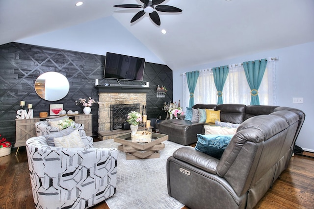 living room featuring wood finished floors, a fireplace, baseboards, ceiling fan, and recessed lighting