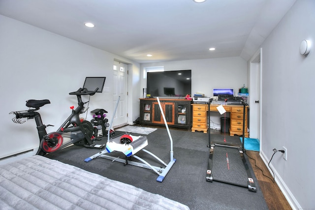 workout room featuring recessed lighting, baseboards, and baseboard heating