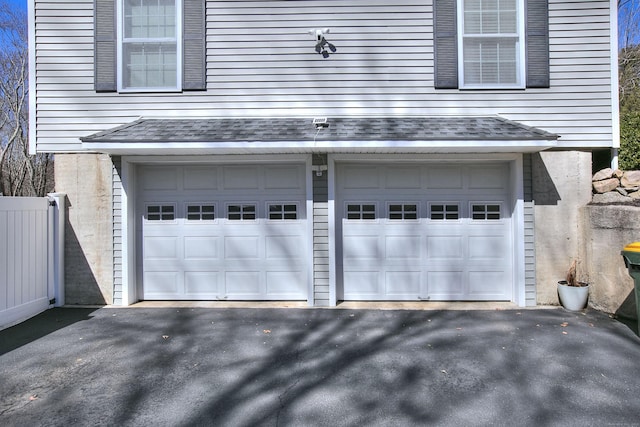 garage featuring driveway