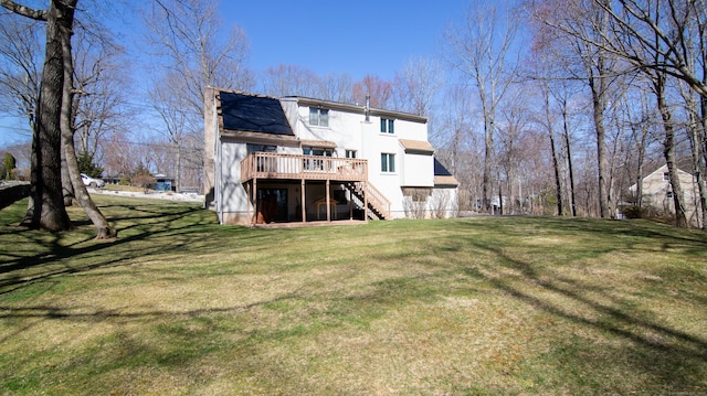 955 Dunbar Hill Rd, Hamden, CT 06514 - back of property with stairs, a deck, and a lawn