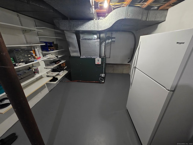 955 Dunbar Hill Rd, Hamden, CT 06514 - unfinished basement featuring freestanding refrigerator and heating unit