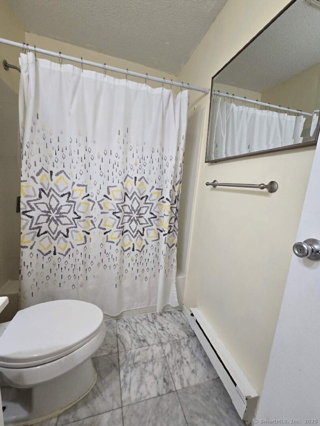 bathroom with toilet, marble finish floor, a textured ceiling, shower / tub combo with curtain, and a baseboard radiator
