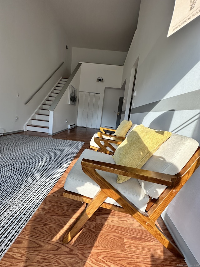3699 Broadbridge Ave Unit 330, Stratford, CT 06614 - staircase with a towering ceiling and wood finished floors