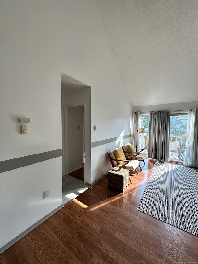 3699 Broadbridge Ave Unit 330, Stratford, CT 06614 - living area with high vaulted ceiling and wood finished floors