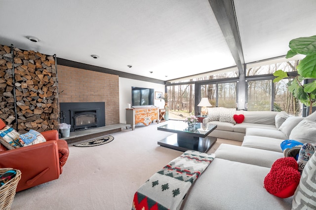 living area with carpet flooring and a large fireplace