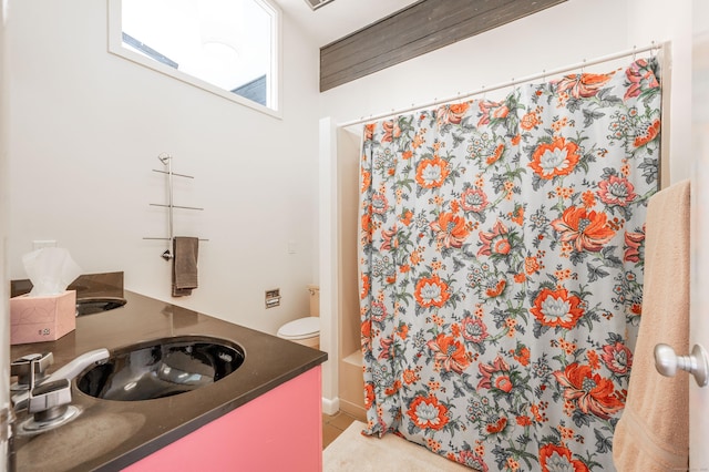 bathroom with tile patterned flooring and vanity