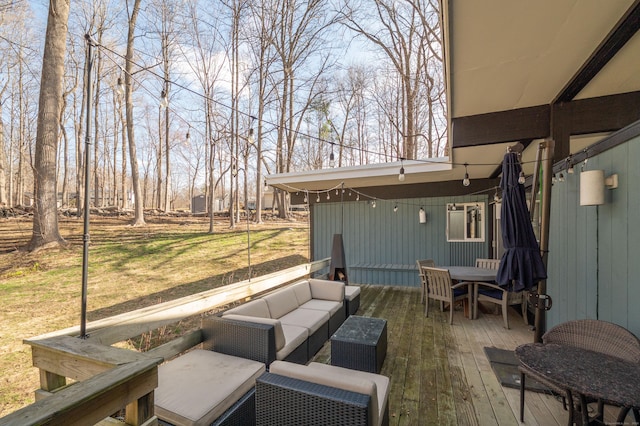 deck with an outdoor hangout area and outdoor dining area
