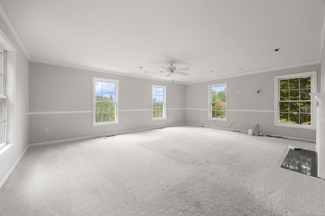 40 Nathan Hale Ct, Cheshire, CT 06410 - empty room with ornamental molding, plenty of natural light, baseboards, ceiling fan, and carpet flooring