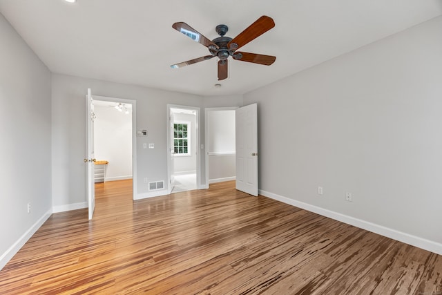 40 Nathan Hale Ct, Cheshire, CT 06410 - unfurnished bedroom featuring light wood finished floors, baseboards, and ceiling fan