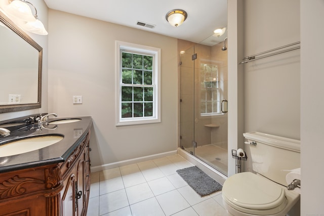 40 Nathan Hale Ct, Cheshire, CT 06410 - bathroom featuring toilet, tile patterned floors, a shower stall, baseboards, and double vanity
