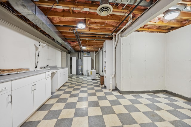 40 Nathan Hale Ct, Cheshire, CT 06410 - unfinished basement with light floors and electric water heater