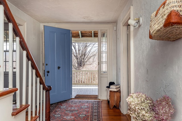 265 Housatonic River Rd, Salisbury, CT 06068 - entryway with a textured wall, wood finished floors, and stairway